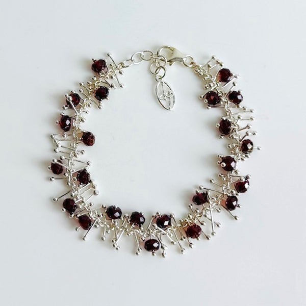 Delicate Feather Bracelet: Garnet
