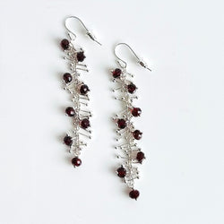 Delicate Feather Earrings in Silver: Garnet