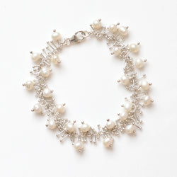 Delicate Feather Bracelet: Pearl